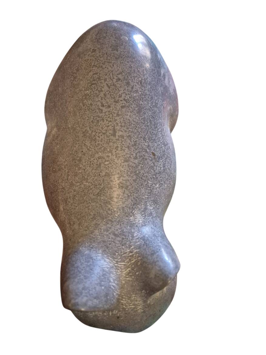 Stone sculpture of a cat Islay Grimes