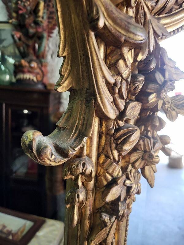 Large Louis XV gilded shell mirror from the 19th century