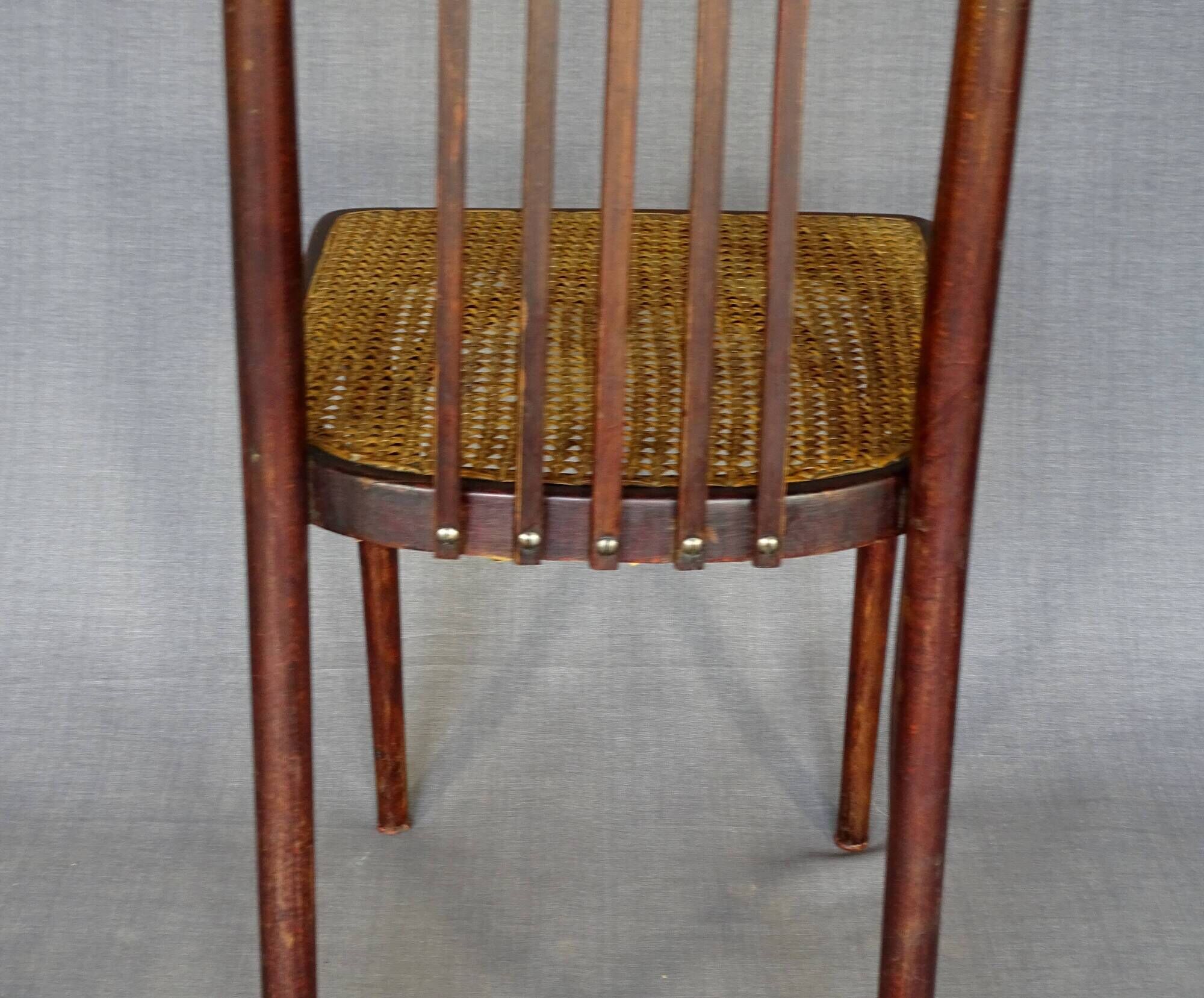 Bistro chair with curved wood by Wojciechow No. 644, not Thonet.