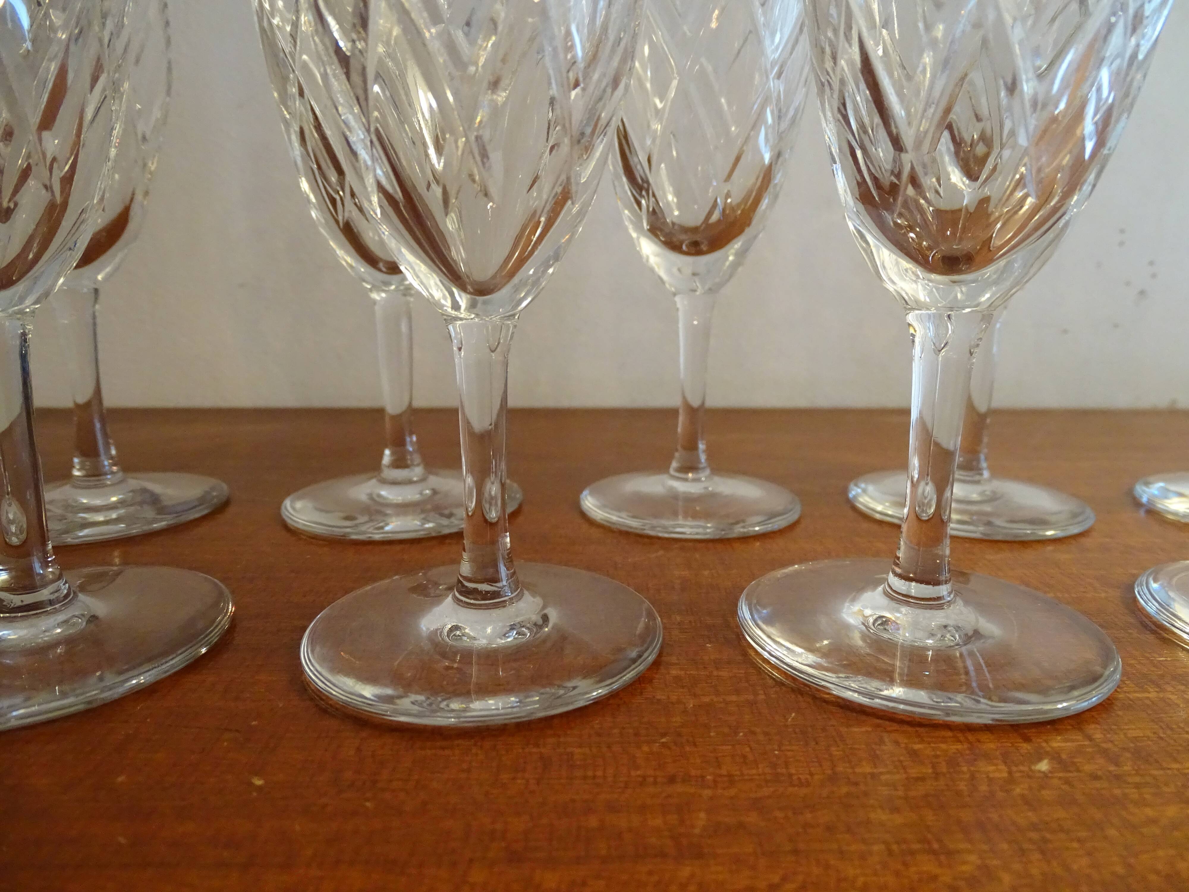 9 Bayel crystal champagne flutes signed, cut crystal.