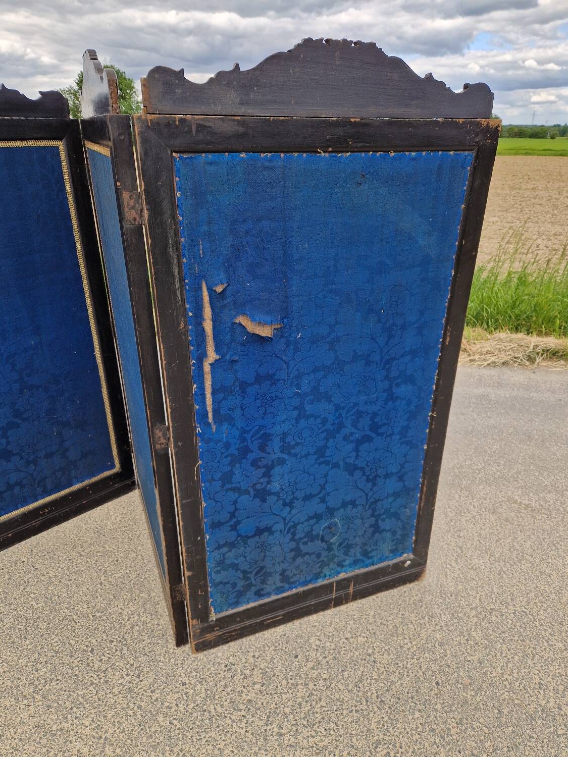 Folding screen in black-painted wood, 19th century