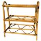 Rattan and glass shelf from the 50s