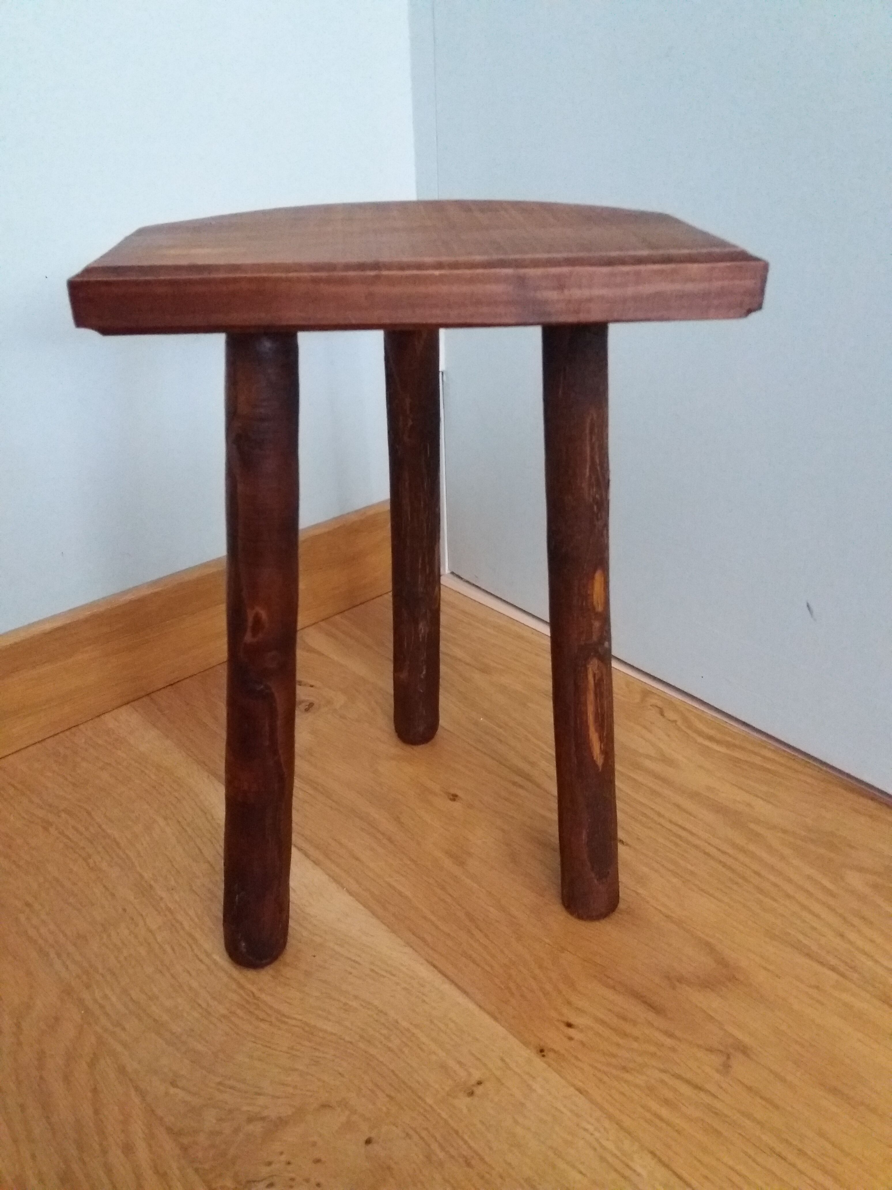 Tripod stool cowherd end of sofa