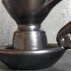 1950s iridescent black ceramic hand candle holder