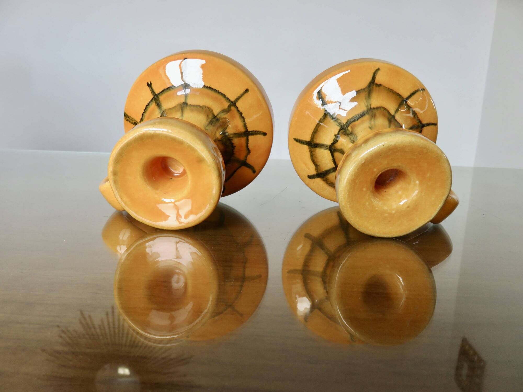 Pair of orange ceramic candlesticks from the 60s