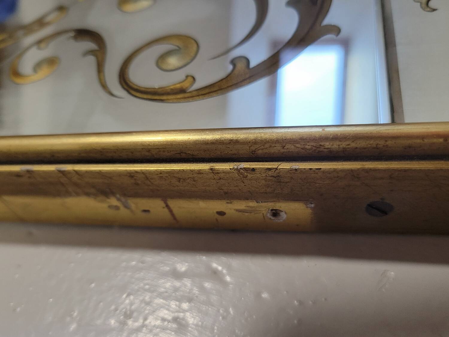 Eglomise brasserie mirror, late 19th century