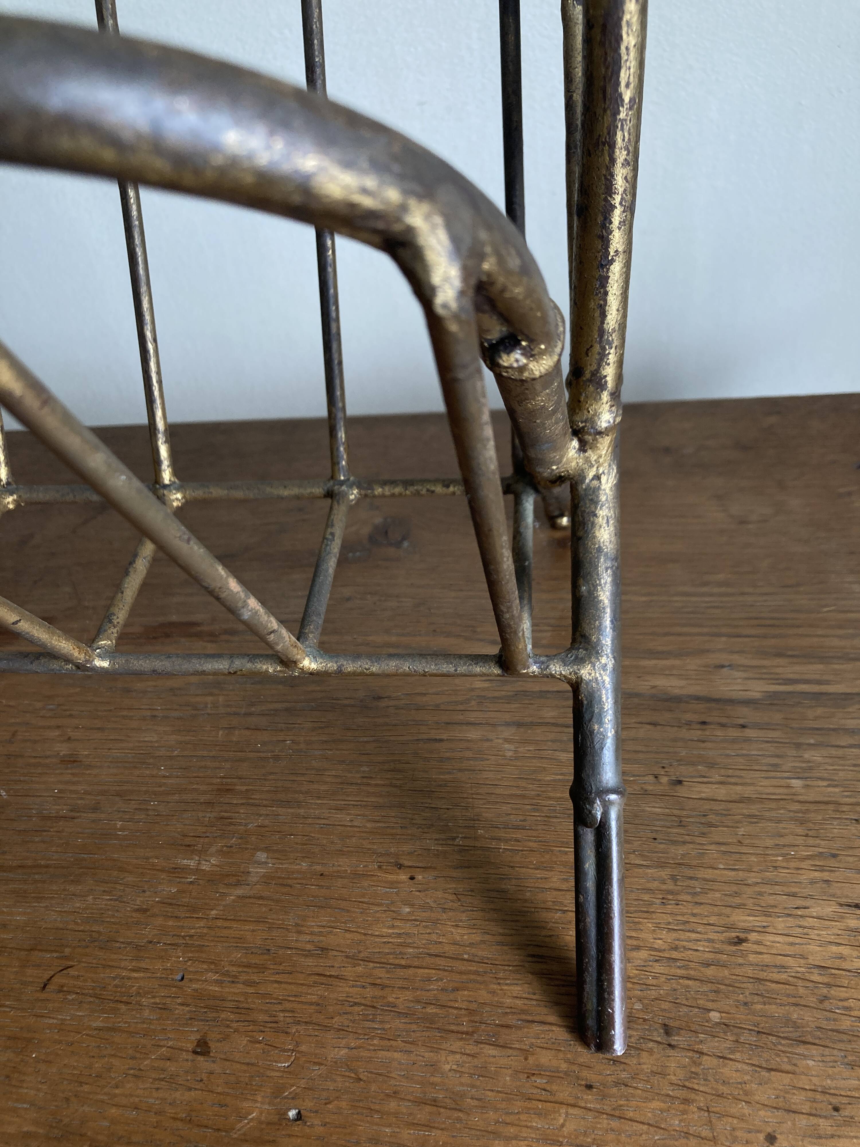 1960s magazine rack in gilded wrought iron, faux bamboo, Italian work