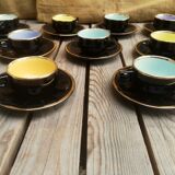 Set of 9 cups and sub-cups in black ceramic and colored gold border