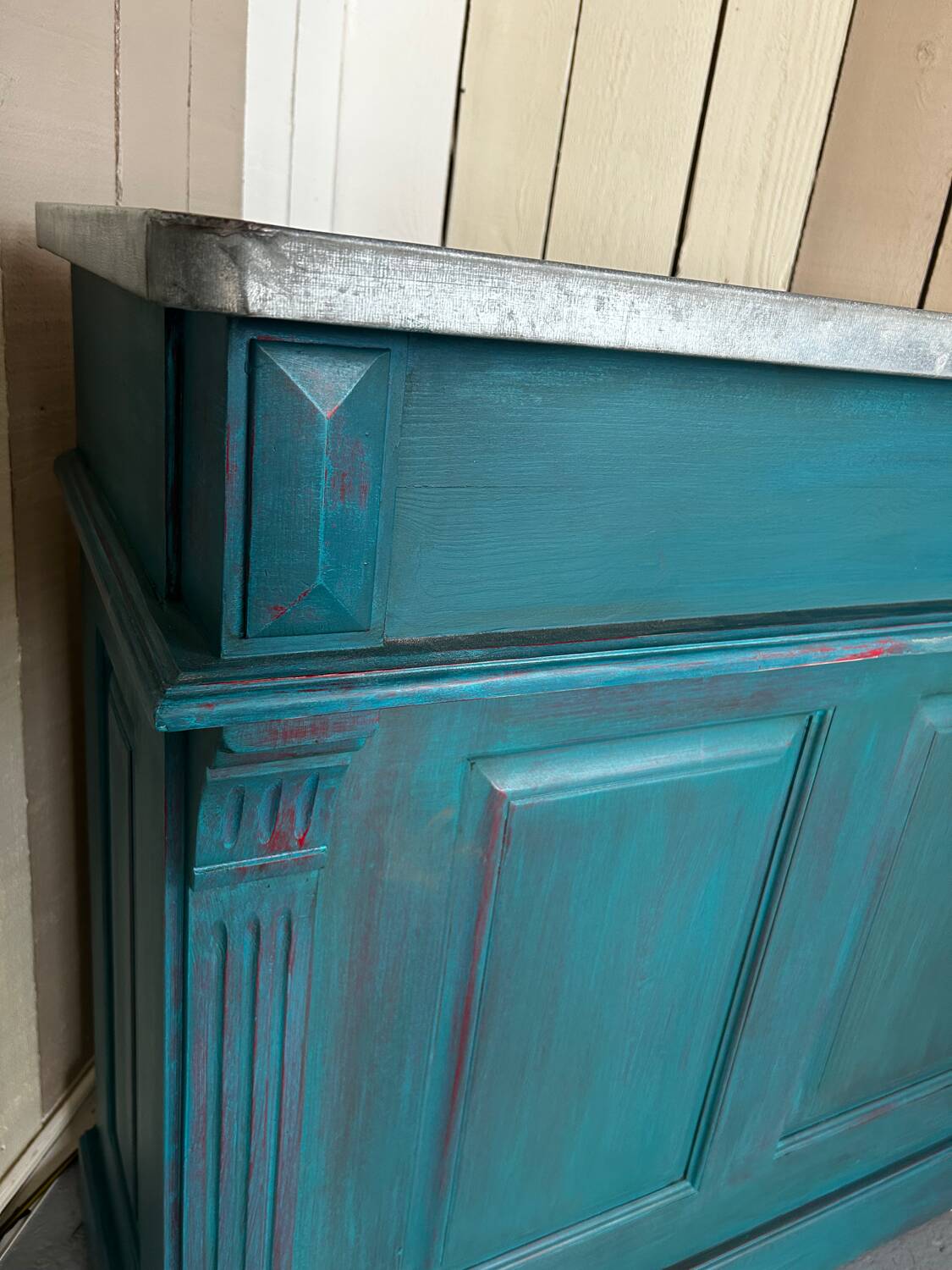 Old wooden trade counter with a zinc top.