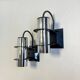 Pair of Targetti Sankey chrome wall lights. 1970s. Italy