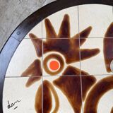 Round ceramic coffee table with “rooster” motif by Dan