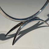 Silver-plated metal and plexiglass design candlestick.