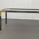 Gunmetal gold metal and smoked glass coffee table from the 70s
