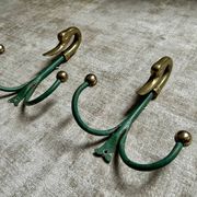 Rare set of swan neck coat hooks with mirror frame attributed to Maison Jansen, France, 1950s.