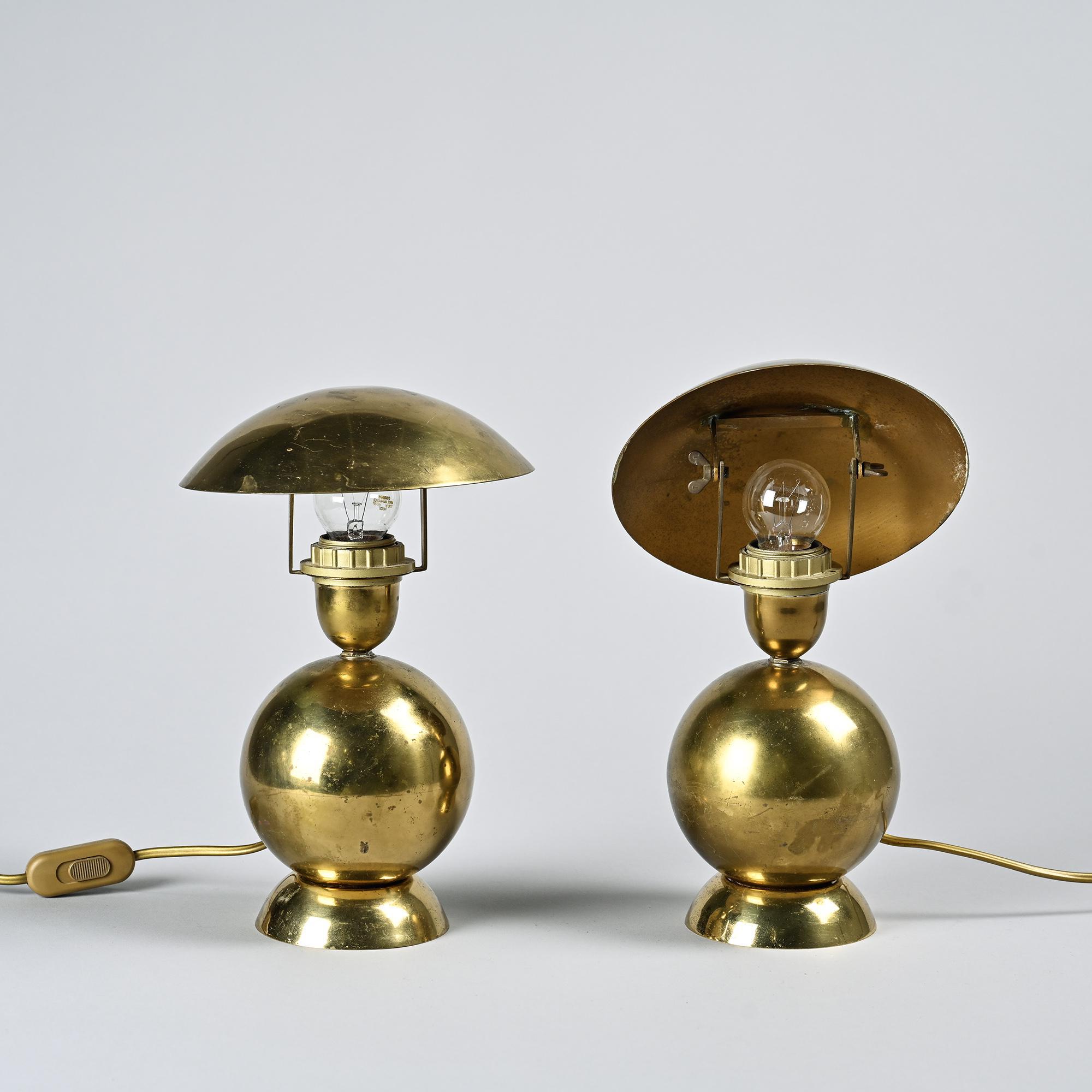 Pair of table lamps in gilded brass, created by Mathias, France, circa 1970.