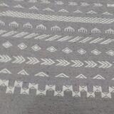 Hand-made grey and white wool rug 138x72cm