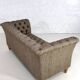 Chesterfield sofa in leather, fabric and wood