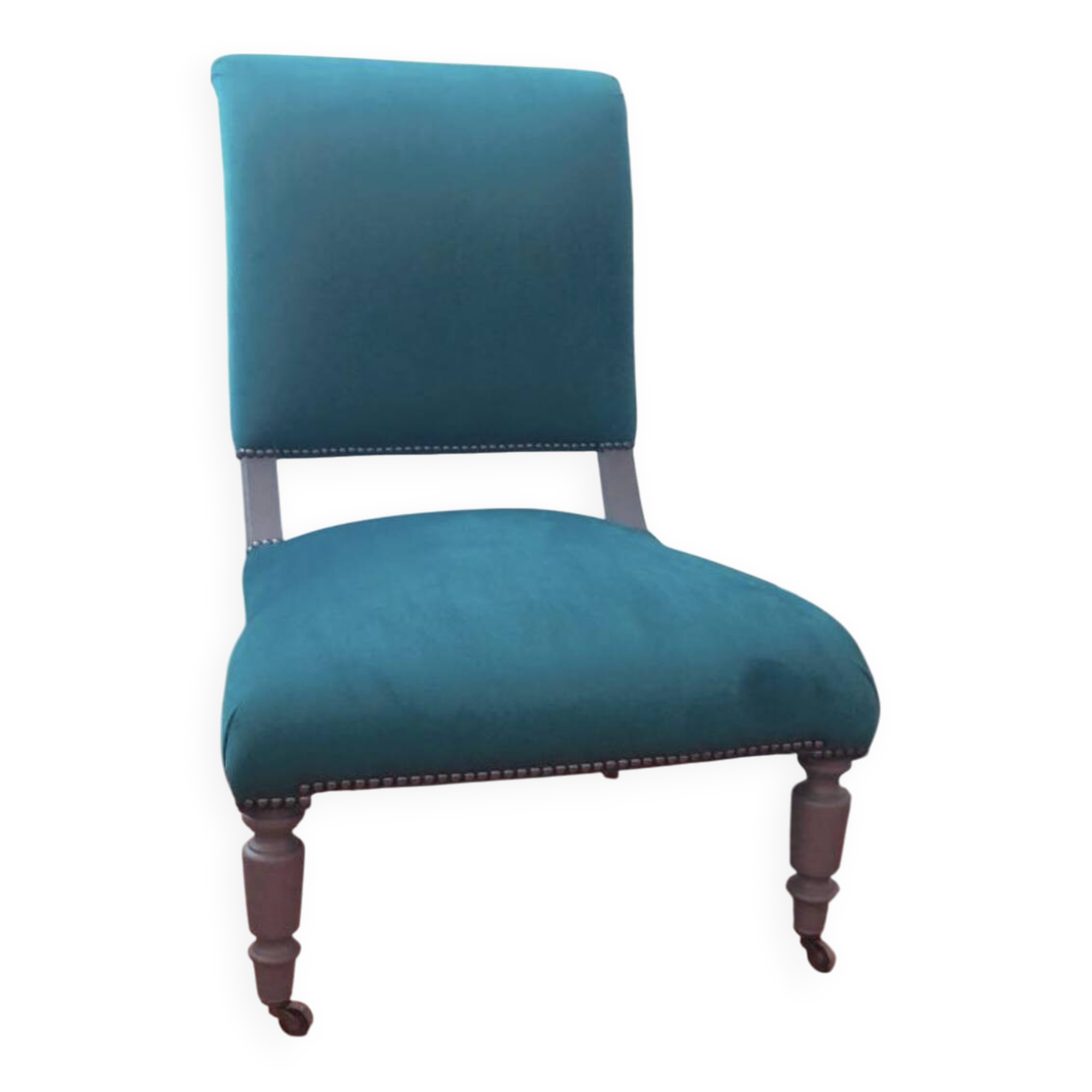 Velvet and studded armchair