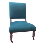 Velvet and studded armchair