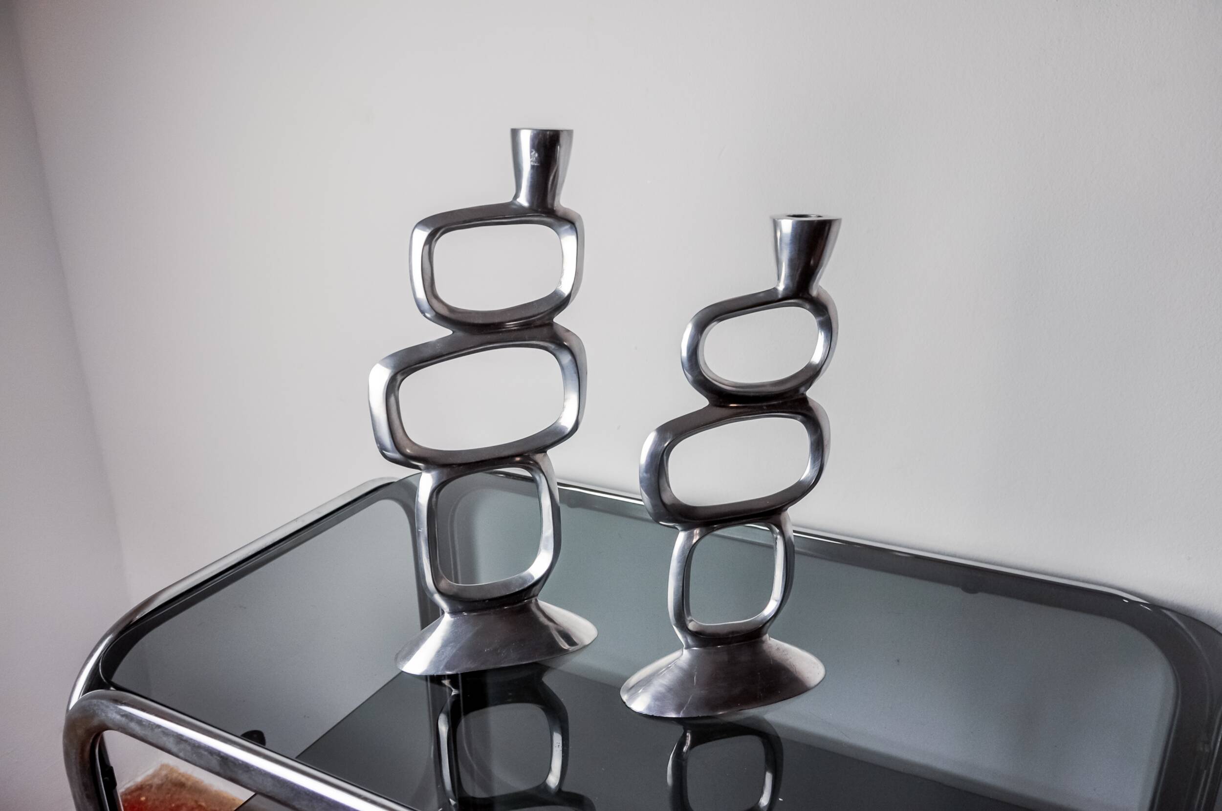 Pair of circle candlesticks by Matthew Hilton, England, 1980