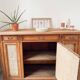 Classic vintage buffet with 3 doors in wood and raffia.