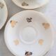 10 anciennes tasses à café avec soucoupes en porcelaine à motifs de fleurs dorées