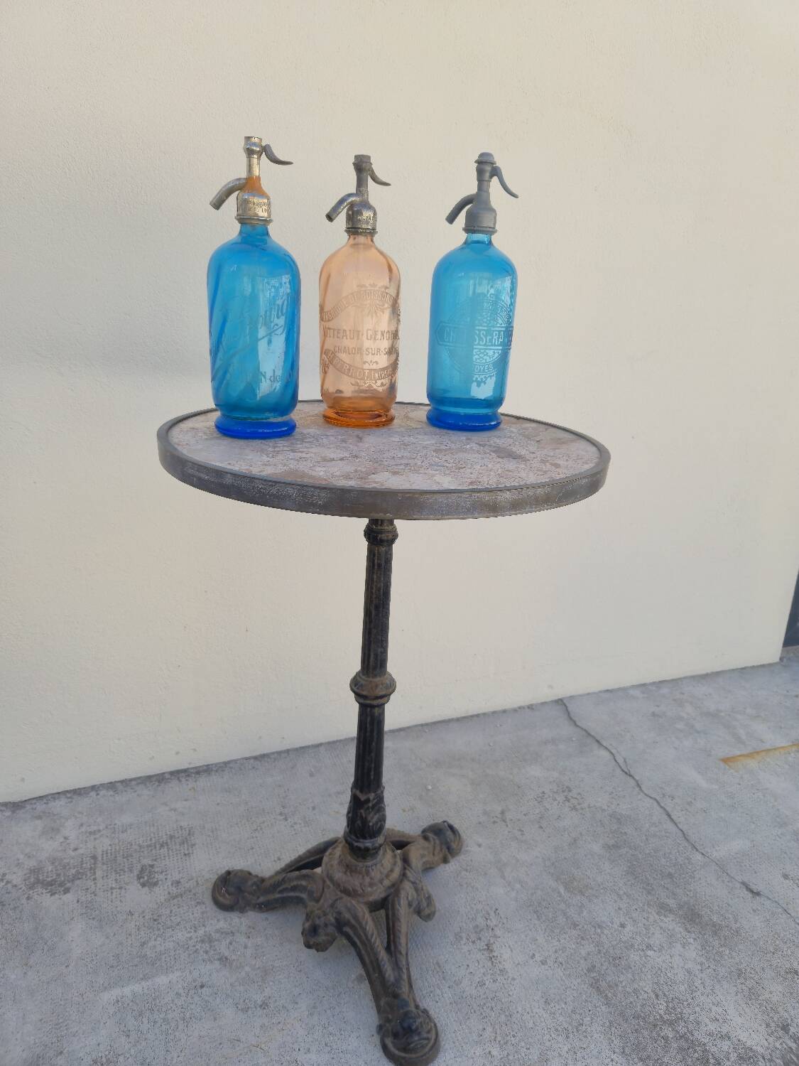 Pedestal table for restaurant bistro with lion paws and marble