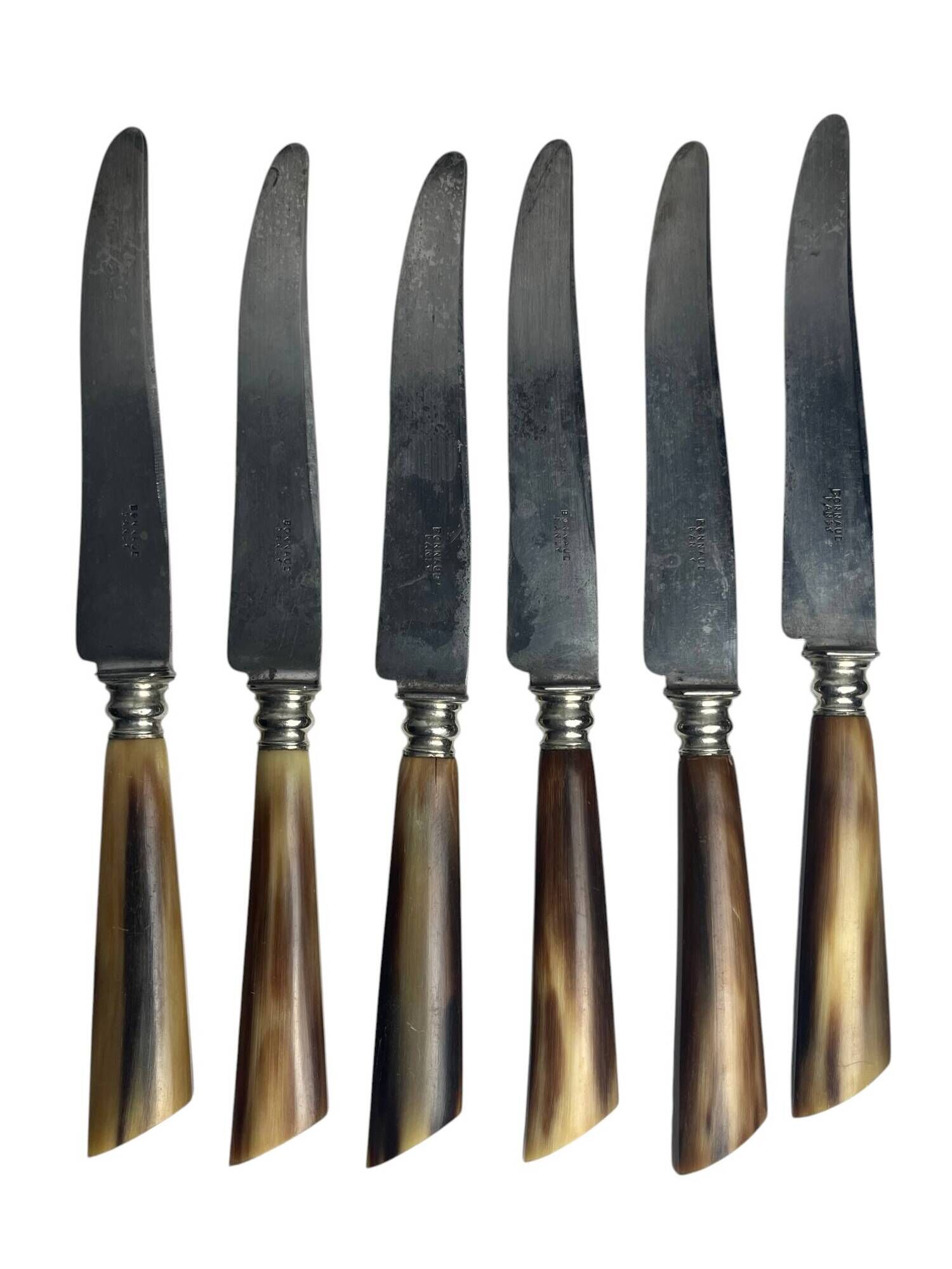 Six knives with steel blades and horn handles, Bonnaud Nancy, early 20th century.