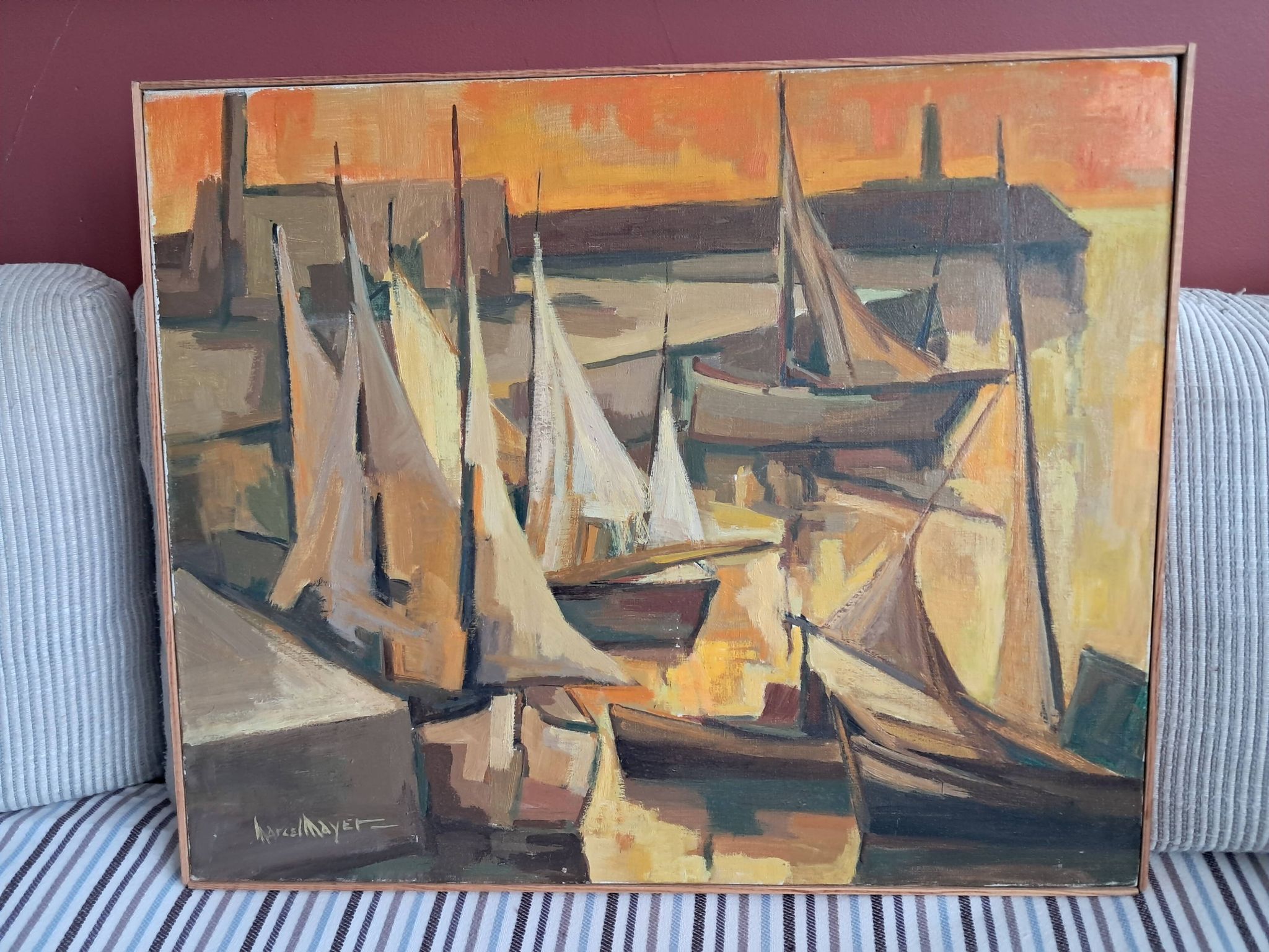 An old oil painting depicting a port, signed by the painter Marcel MAYER.