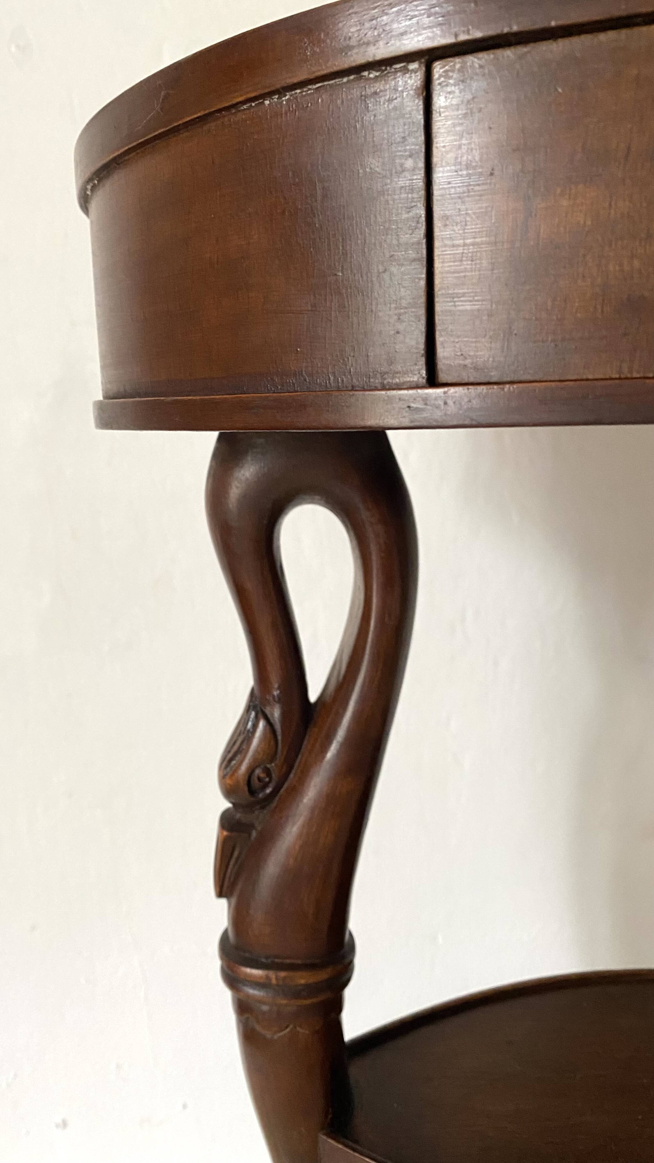Empire style swan neck and lion paw pedestal table