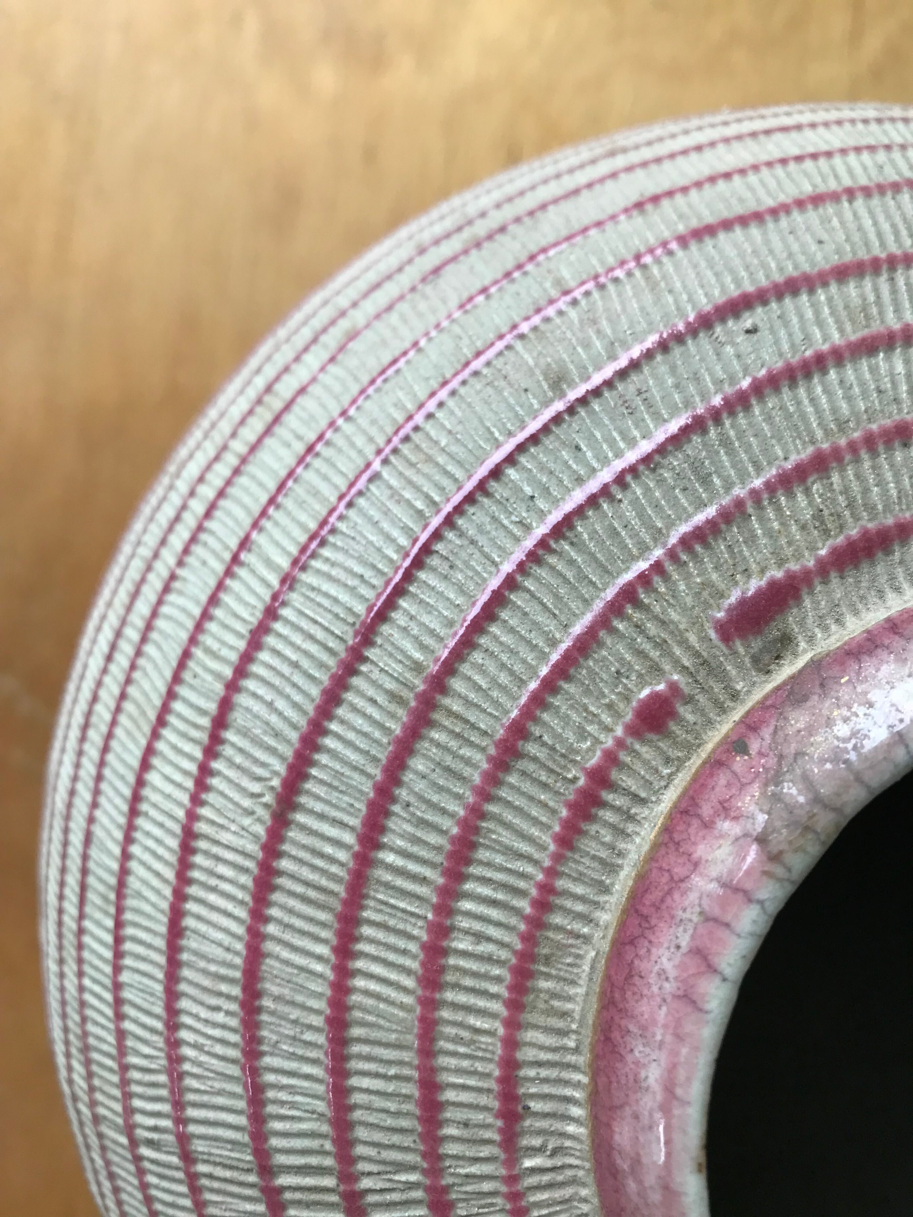 Glazed terracotta vase.