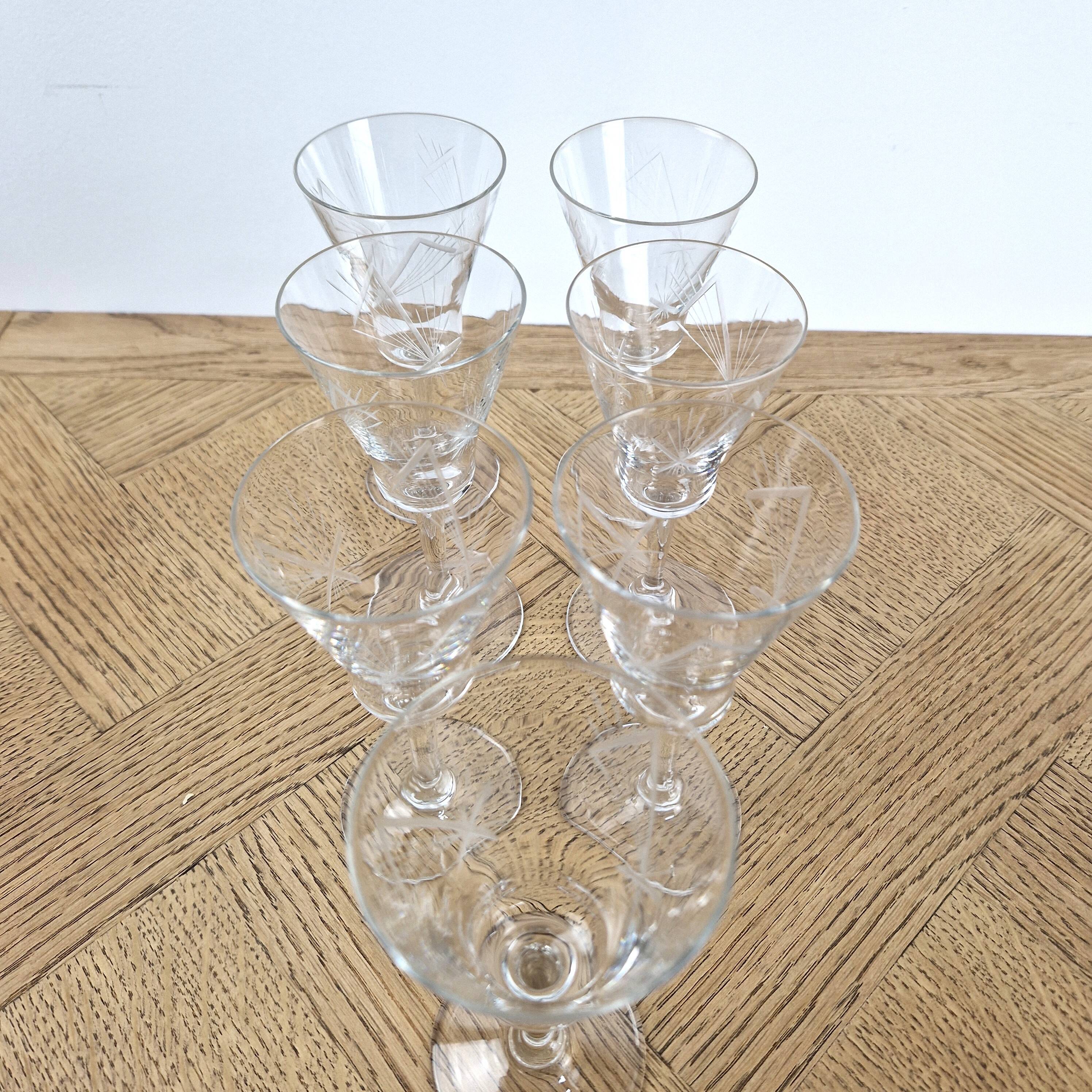 7 crystal footed glasses, antique white wine glasses.