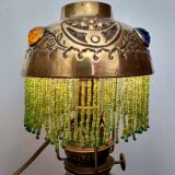 Brass lamp "La Parisienne" at the end of the 19th century.