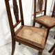 Set of six Art Deco chairs in solid walnut, 20th century.