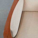 Art Nouveau design armchair with a luxurious light fabric upholstery