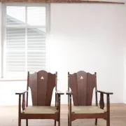 Pair of low Brutalist oak lounge chairs with new rush seats – circa 1935