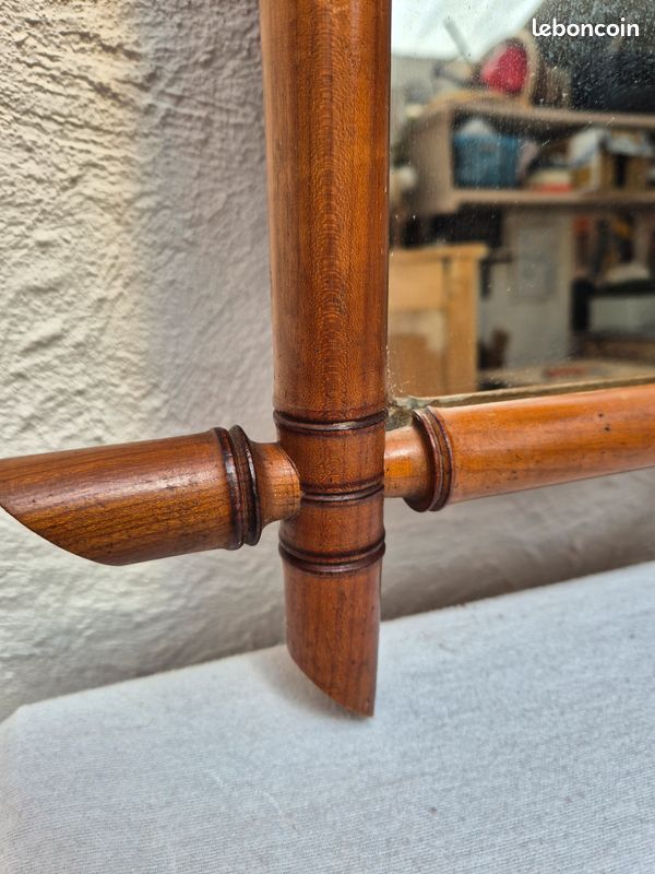 Vintage wooden mirror imitating bamboo