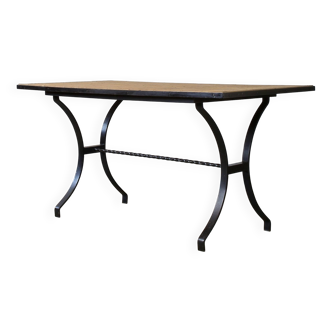 Dining table in rattan and wrought iron similar to Audoux & Minet.