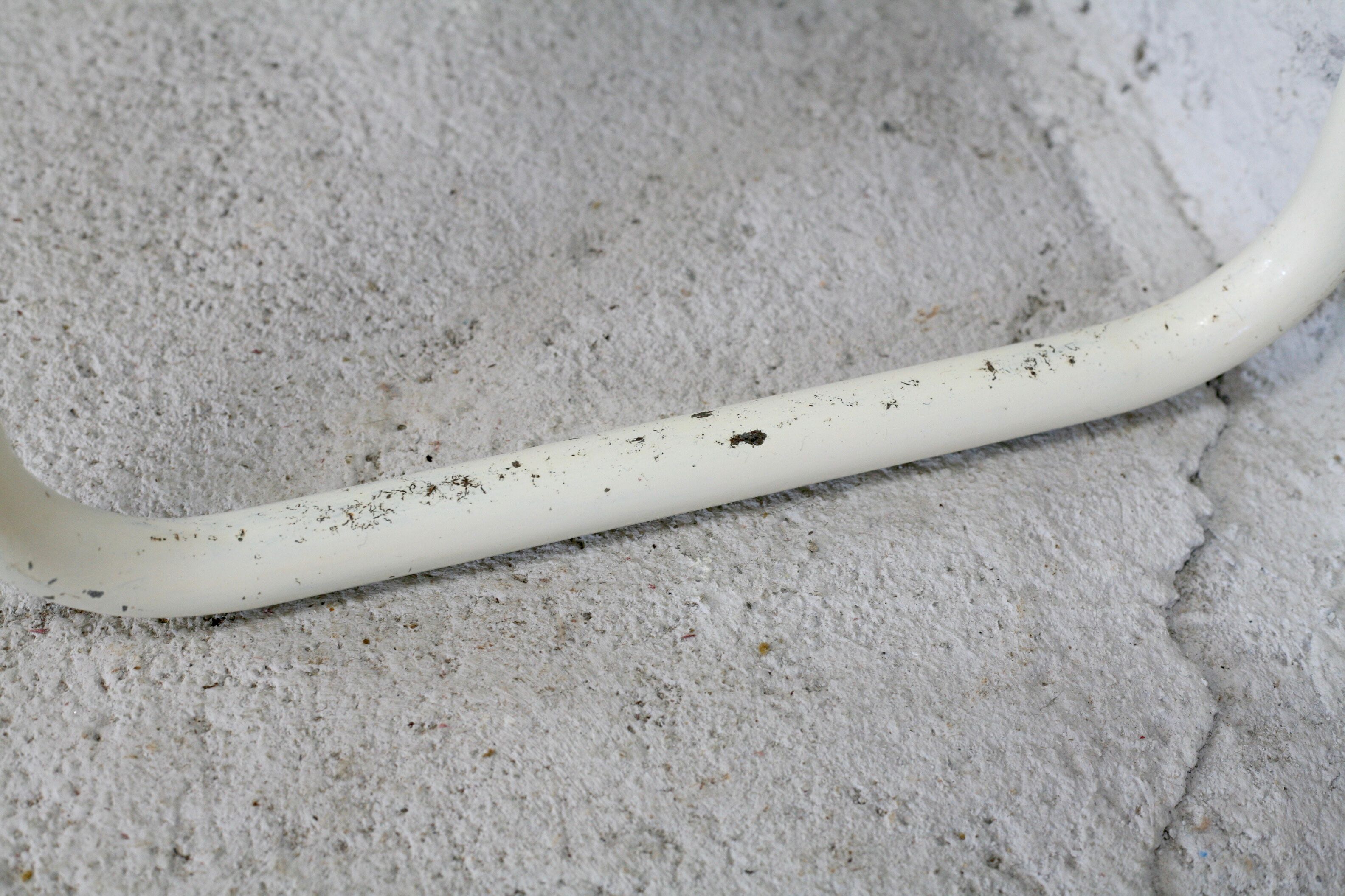 Tubular steel console, black glass tray, circa 1950