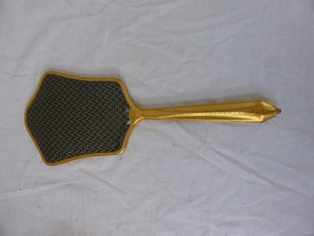 Mirror gold metal of the 1960s