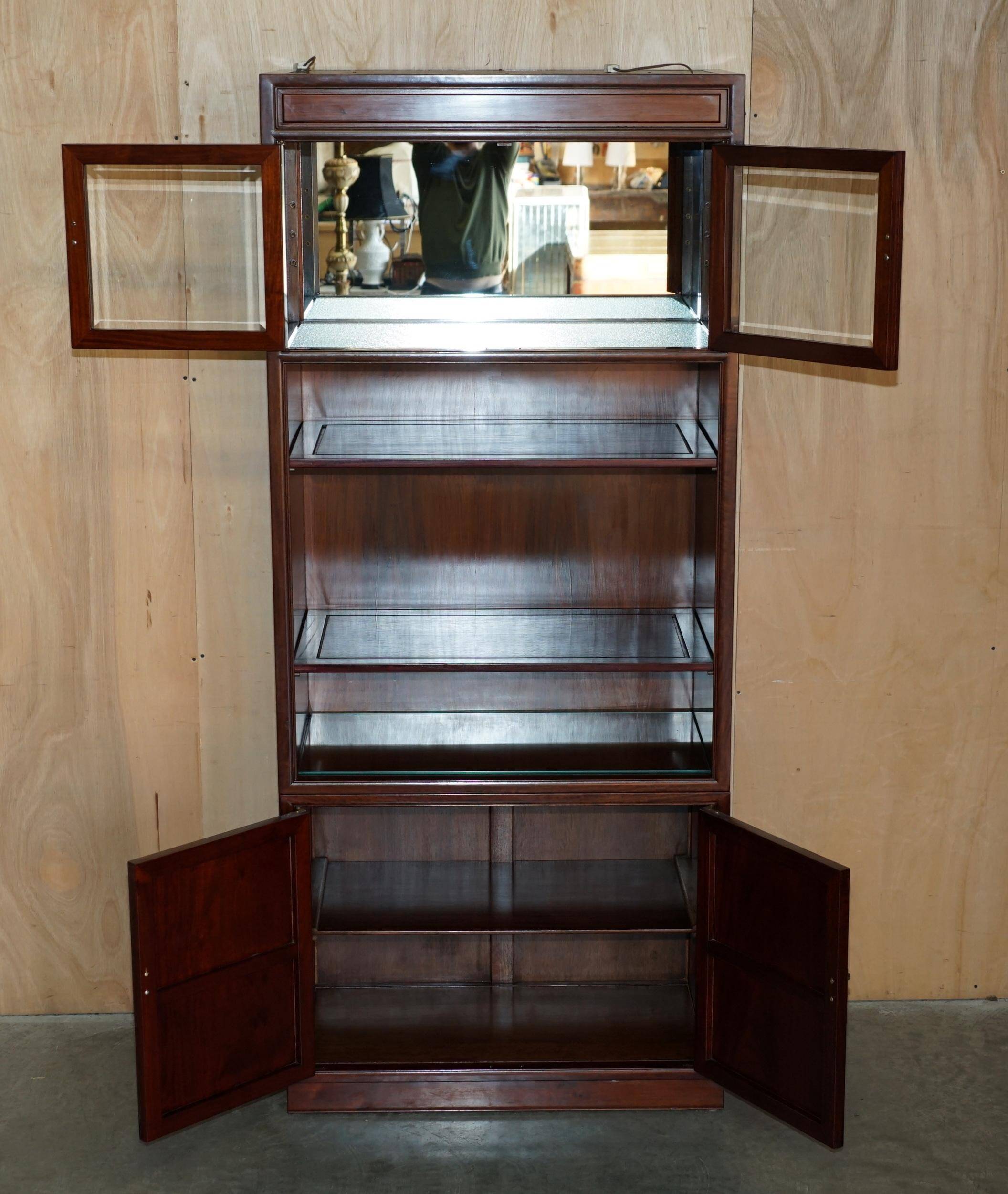 Set of three vintage hardwood military-style bookshelves.