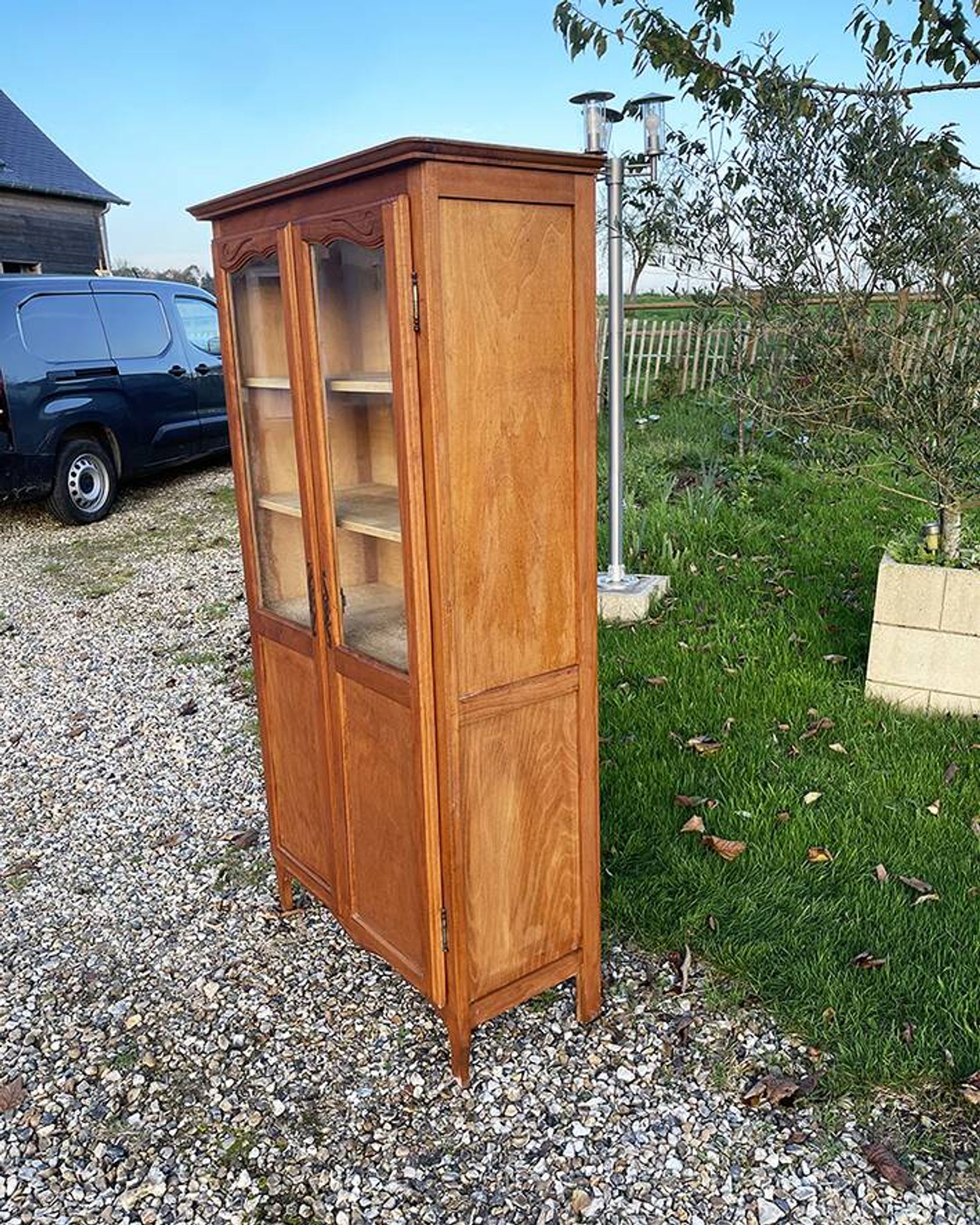 Old light wood display cabinet