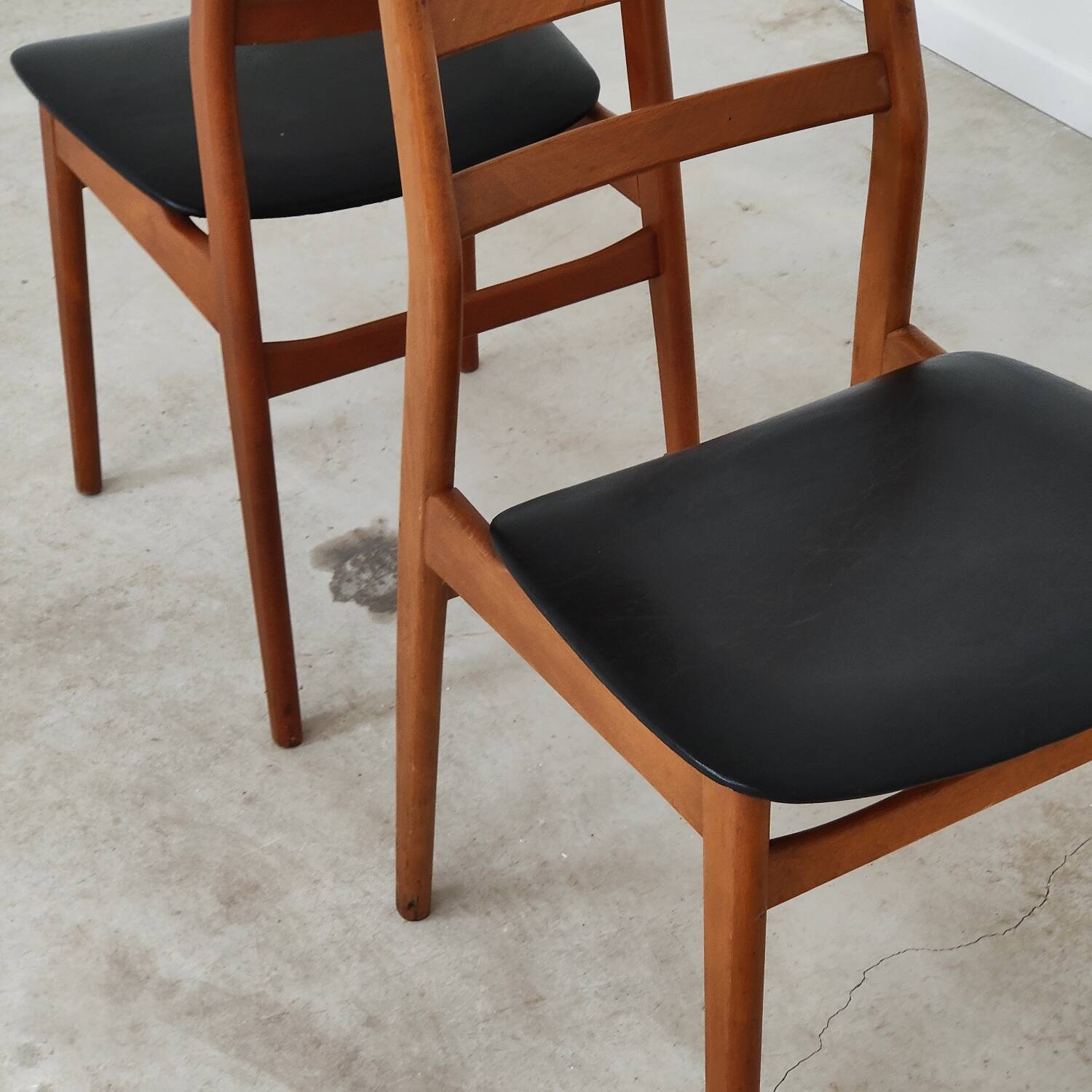 Pair of Scandinavian style leather and wood chairs 1970