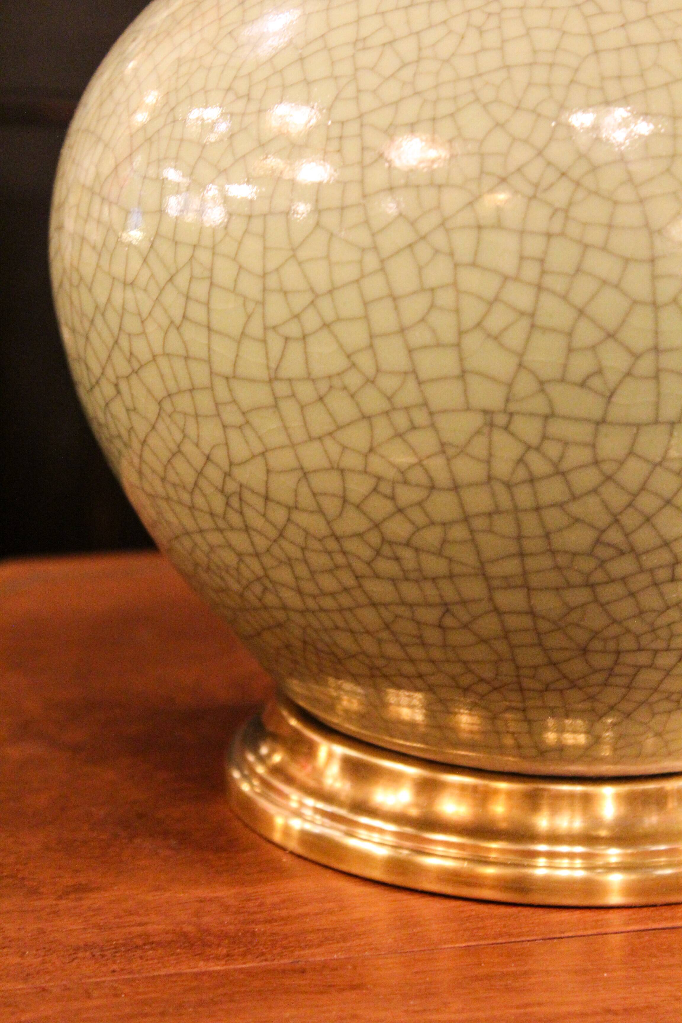 Ceramic lamp with a crackled celadon green finish.