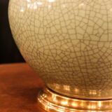 Ceramic lamp with a crackled celadon green finish.
