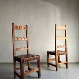 2 brutalist carved wood dining chairs with leather seat | The Netherlands | 1970s