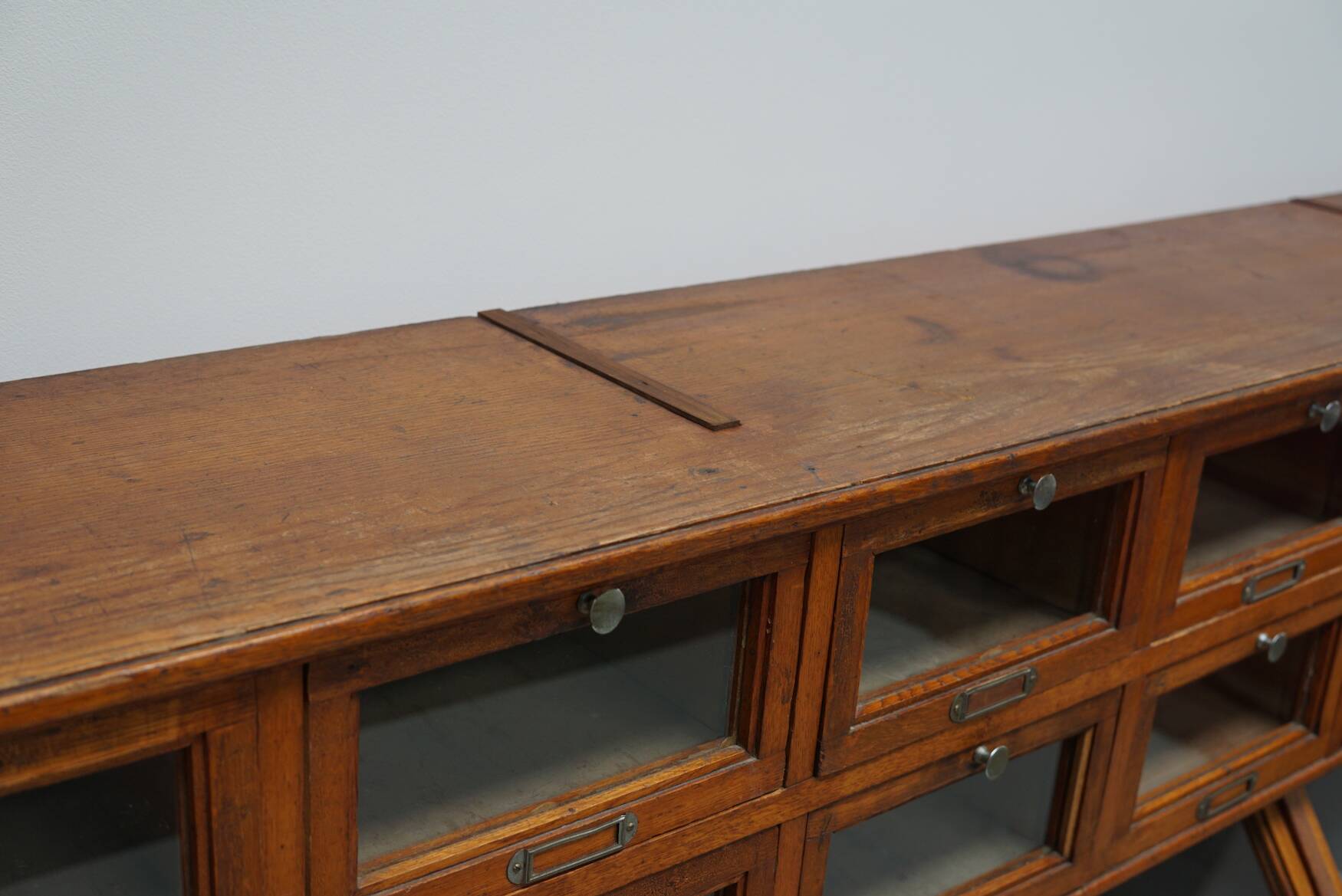 Very large Dutch oak showcase for grocery or haberdashery, 1920s-1930s