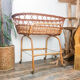 Couffin on foot in vintage rattan 50s