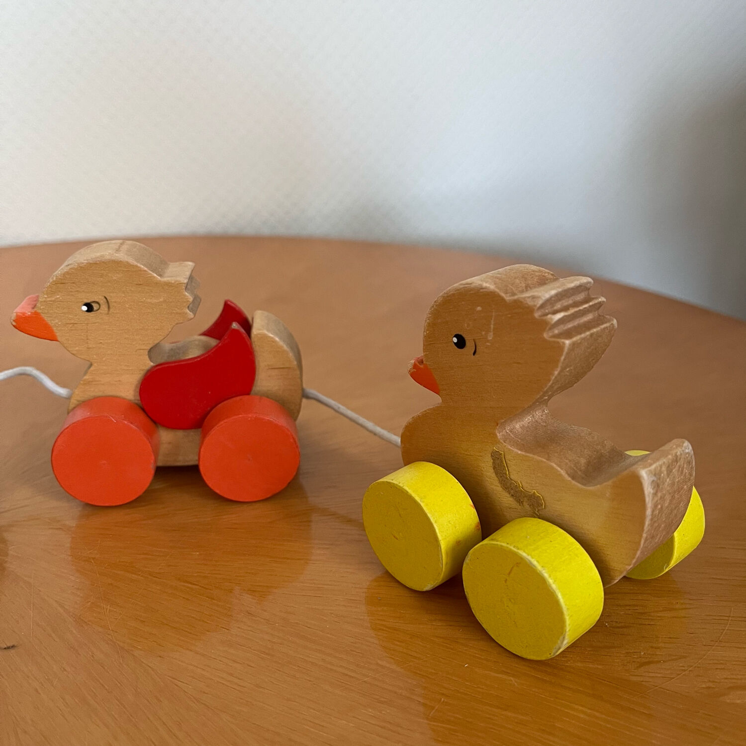 Old vintage wooden duck toy to pull