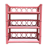 Pink rattan shelf